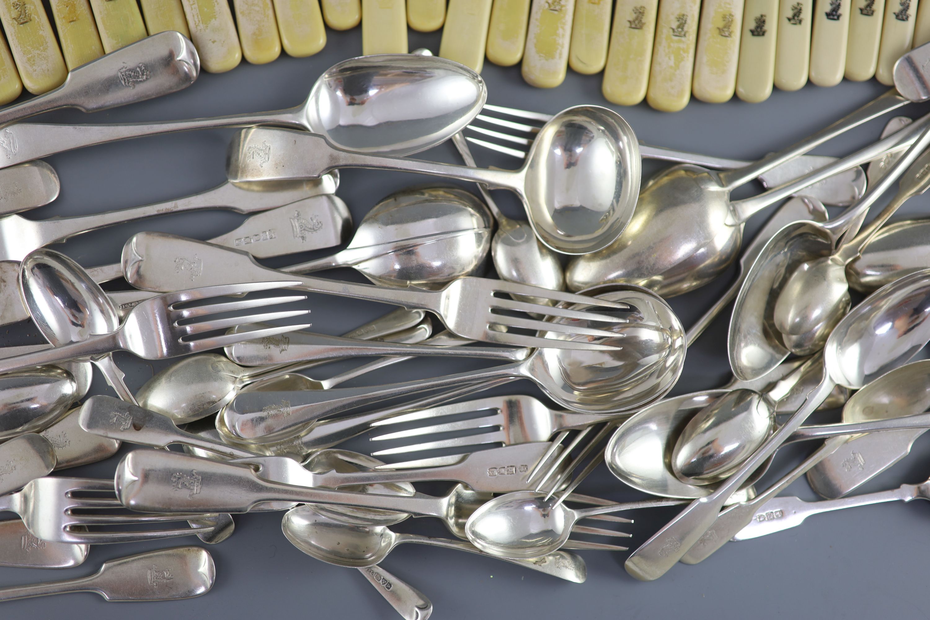 A 19th/20th century century harlequin canteen of silver fiddle and Old English pattern cutlery, comprising ninety seven items, mainly Josiah Williams & Co, London, 1900